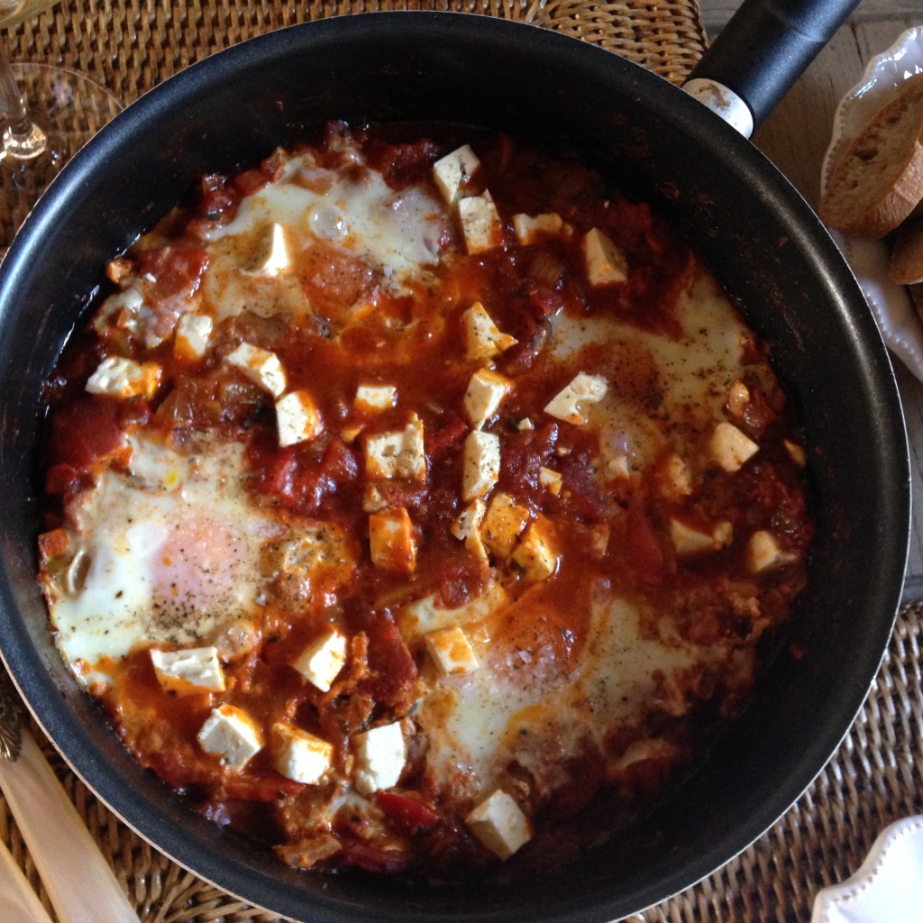Shakshuka, a delicious Arabian inspired dish with tomato, eggs, lots of spices and herbs.