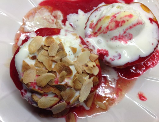 Peach Melba is a delicious dessert made with fresh peaches, vanilla ice cream, raspberry sauce and almond flakes. I love it